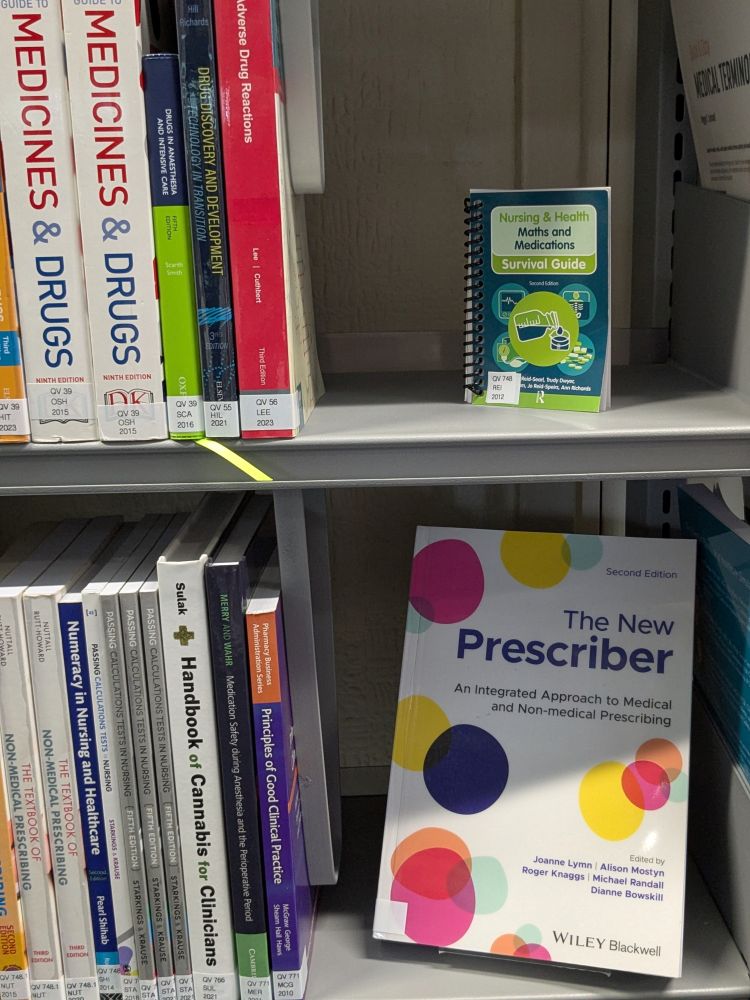 A little book on display, ruining our 'every other shelf' book display pattern!