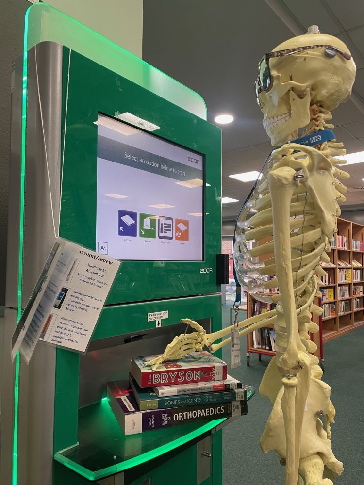 Scully the Skeleton smartly using our self service machine to take out his loans!
