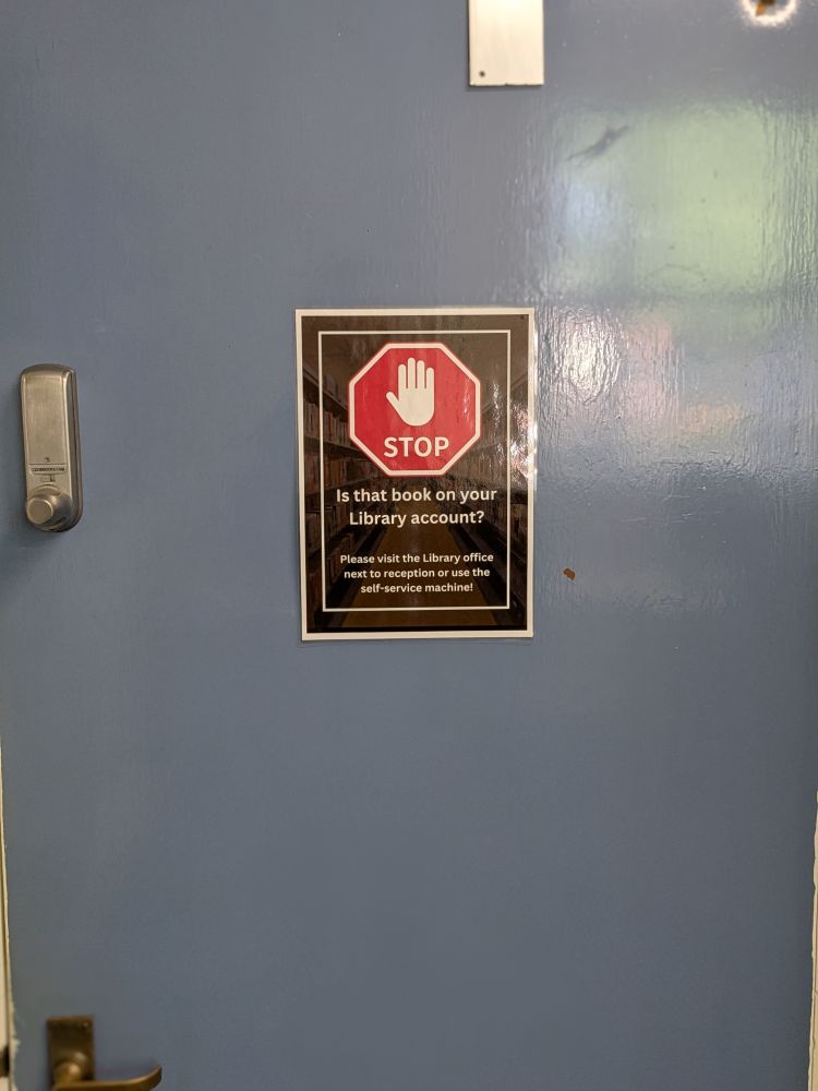A clean door with a poster on it!