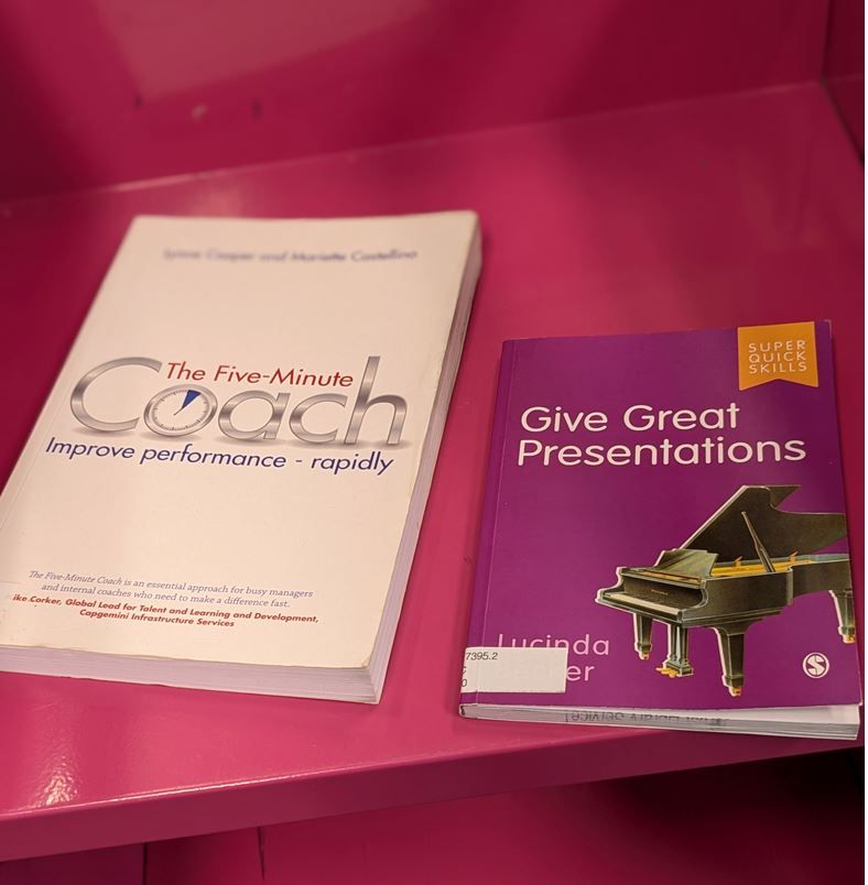 2 books - 'The Five Minute Coach' and 'Give Great Presentations' on our returns trolley!