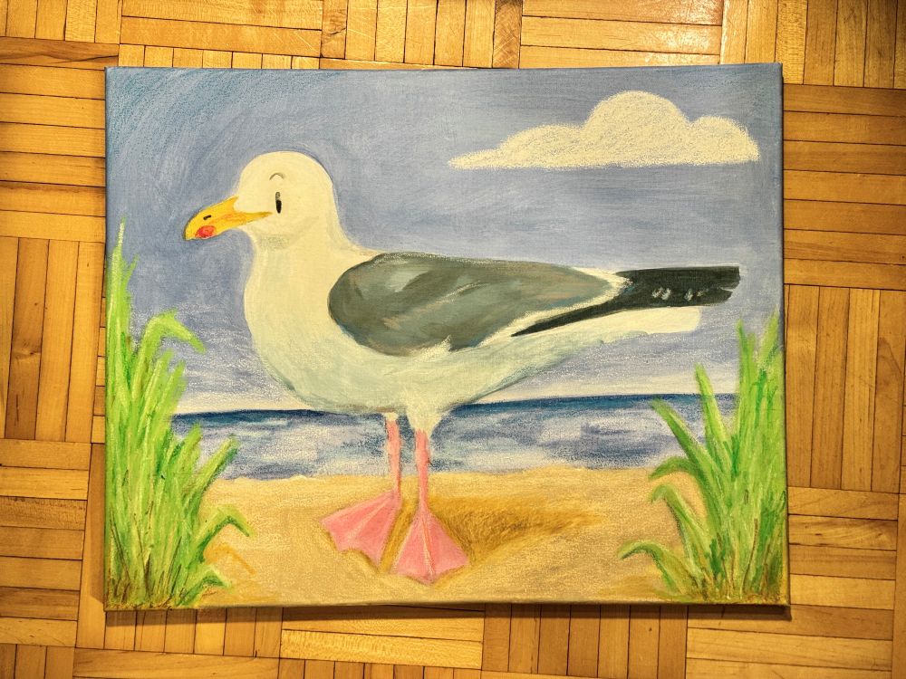 A large cartoony painting of a herring gull standing on the beach. The seagull is white with grey wings and pink legs.