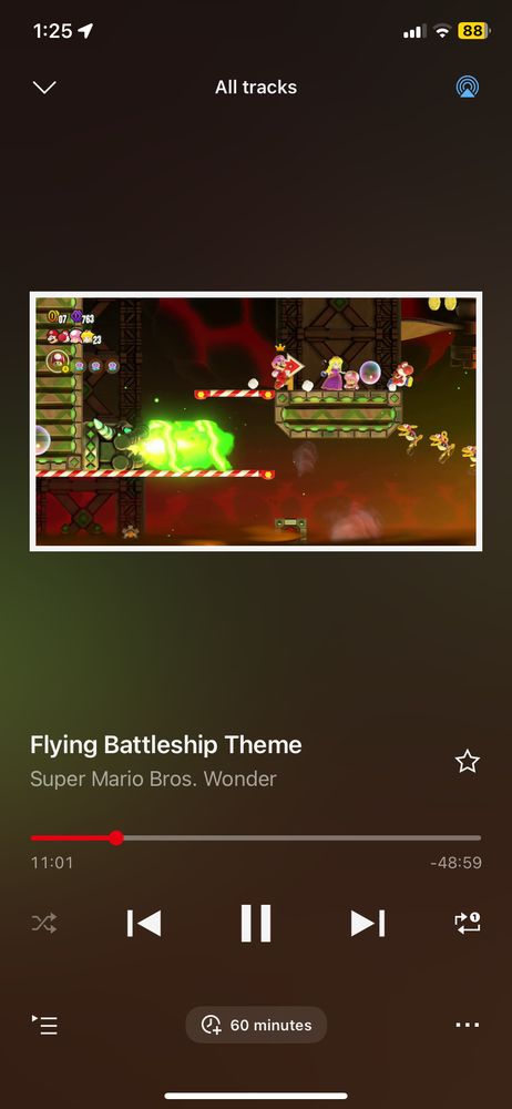The Now Playing view of Nintendo Music, showing the current track as “Flying Battleship Theme” from “Super Mario Bros. Wonder”.