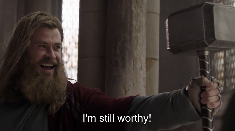 Thor holding his hammer. The caption reads “I’m still worthy!”