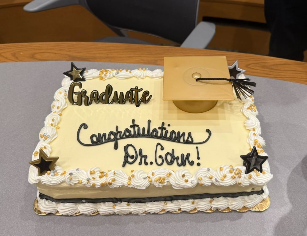 Cake that says Congratulations Dr. Corn!
