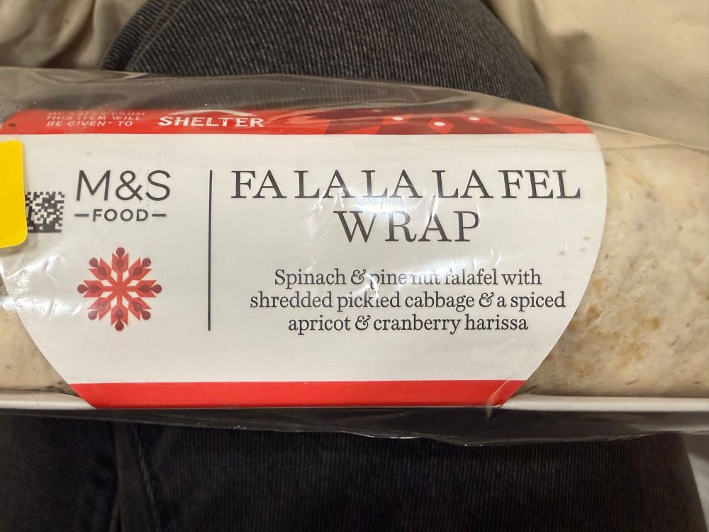 Wrap de falafel en el que pone “Fa la la la fel wrap”