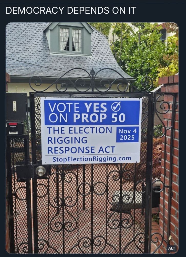 Sign outside a home reading "Vote Yes on Prop 50."