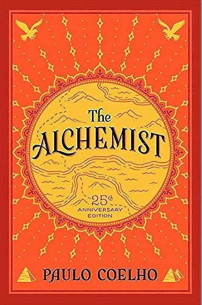 Book cover the The Alchemist by Paulo Coelho. Orange background bordered by a darker orange. Yellow sun shape with two yellow birds in the top corners and one pyramid in the bottom left and two pyramids in the bottom right. The inner circle of the sun looks like a hand drawn map.