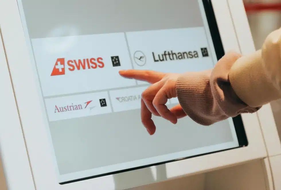 Person selecting an option on a touch screen