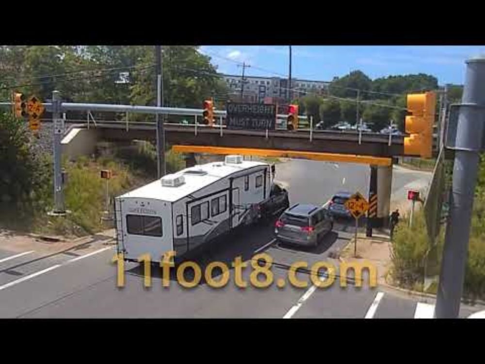Camper gets stuck at the 11foot8+8 bridge