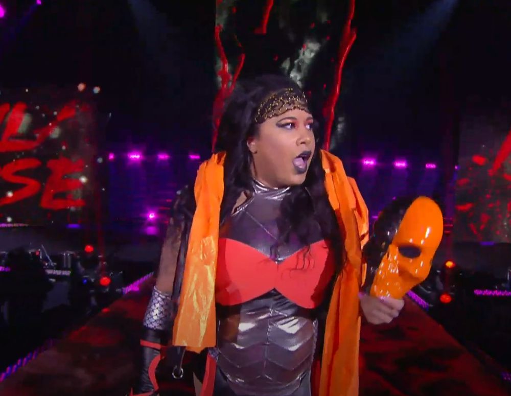 nyla rose at aew revolution 2020, in ring gear designed to look like the dc character, deathstroke the terminator.