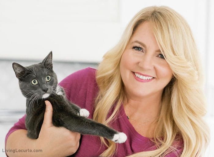 Amy Locurto with gray tuxedo cat.