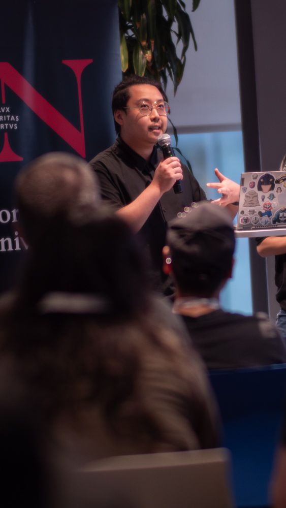 Photo of Remy Siu speaking at Vancouver Game Dev Series in October 2024