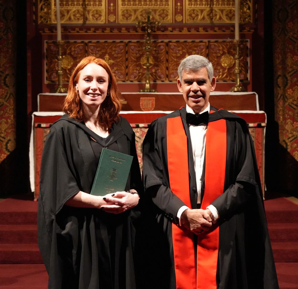 Professor Hannah Fry stands beside Dr Mohamed El-Erian in formal wear.