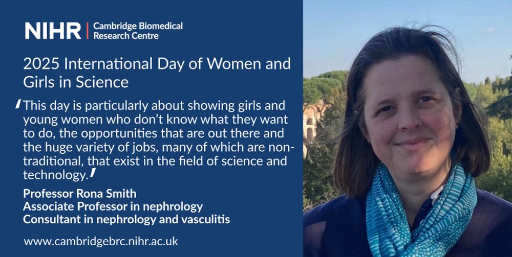 Dr Rona Smith wearing a light blue scarf over a navy blue top with trees in the background and a blue sky