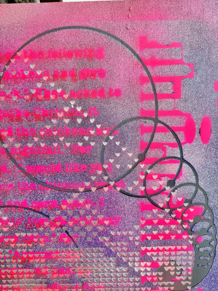 Close-up view of an abstract painting featuring a vibrant palette of pink, purple, and red with layered stencil text and repeating heart-shaped patterns arranged in grid-like rows. Several overlapping circular outlines create a dynamic, flowing visual effect, adding depth to the composition. The text, though partially obscured, hints at a digital or computational theme, blending seamlessly with the intricate and textured background.