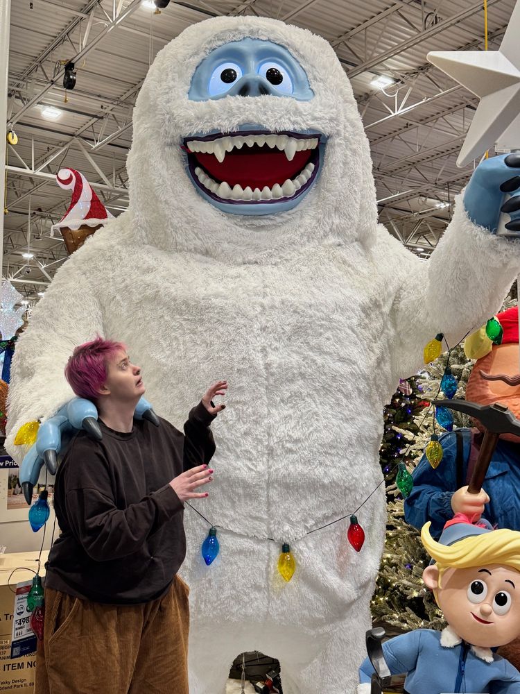 An abominable snow man, an elf, and Ratio at Lowes.
