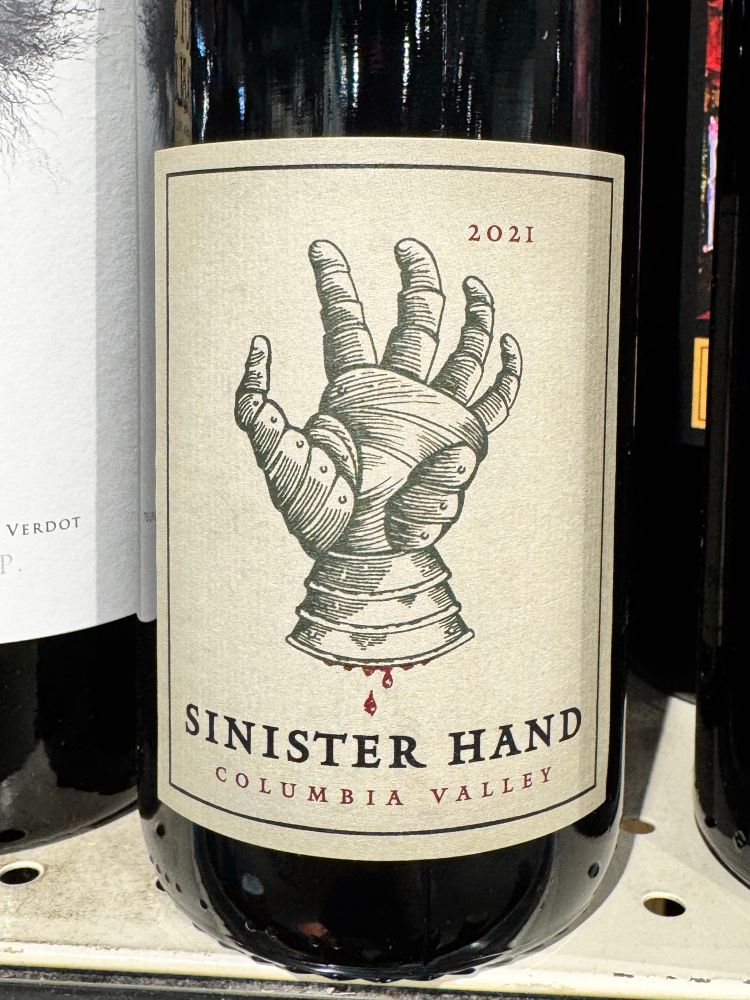 A wine called sinister hand with a glove from a suit of armor dripping blood.