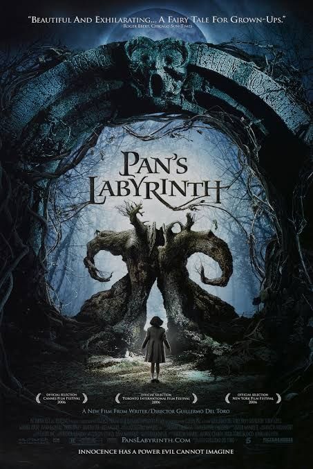 Poster for Pan's Labyrinth. A young girl stands in front of an ominous fantasy tree with a gap through the middle. 