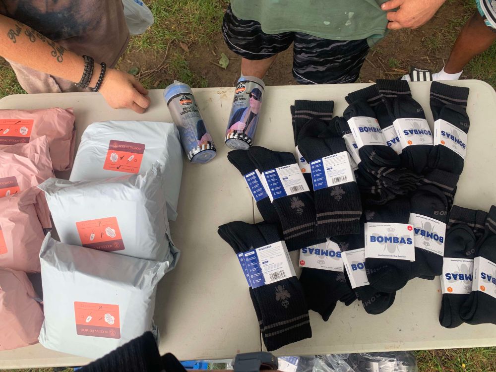 Period packs and Bombas socks on a table