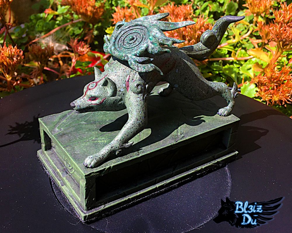 Photo of a figure of Amaterasu I made, similar to the statue found in Kamiki Village at the start of the game Okami when Amaterasu is called awakened by Sakuya.