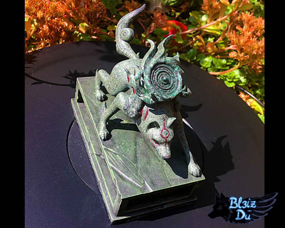 Photo of a figure of Amaterasu I made, similar to the statue found in Kamiki Village at the start of the game Okami when Amaterasu is called awakened by Sakuya.