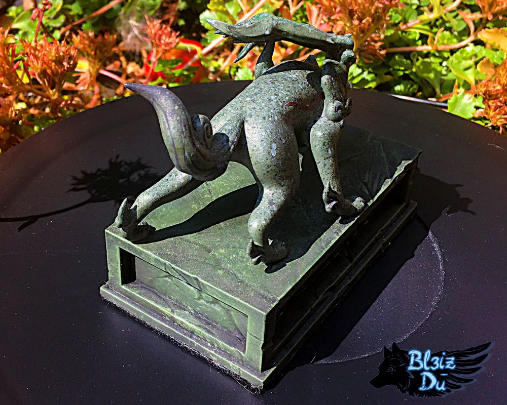 Photo of a figure of Amaterasu I made, similar to the statue found in Kamiki Village at the start of the game Okami when Amaterasu is called awakened by Sakuya.