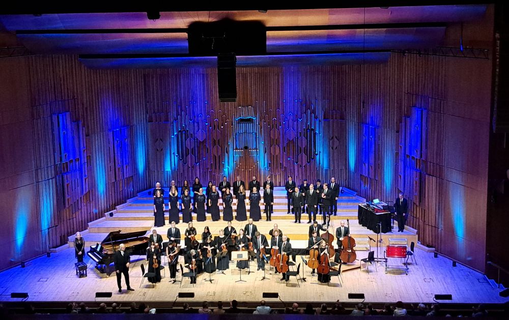 Photograph of the stage at the Barbican showing Estonian Philharmonic Chamber Choir, Tallinn Chamber Orchestra & conductor Tõnu Kaljuste at the end of their performance
https://www.barbican.org.uk/sites/default/files/documents/2025-10/Estonian%20PCC%20Pa%CC%88rt%20for%20web.pdf 