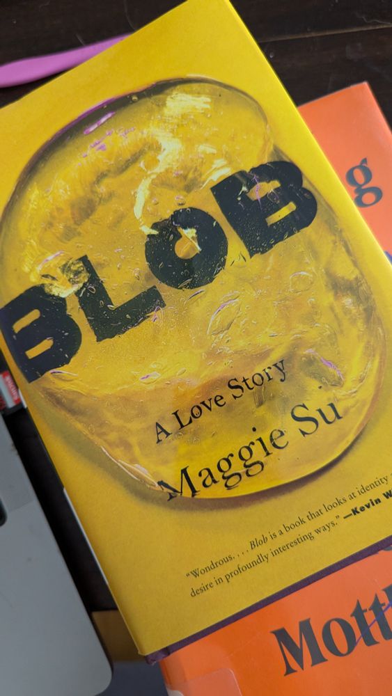A yellow book cover featuring a gelatinous blob over the words BLOB A Love Story. Maggie Su