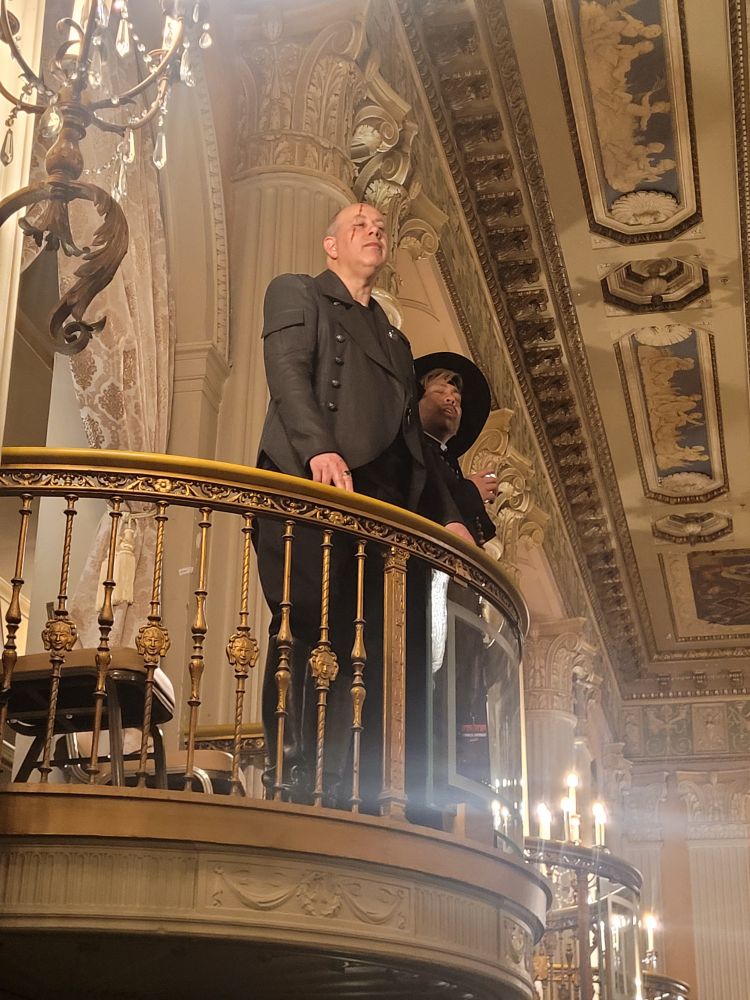 Jason Carl, as Renato Cristoval atop a balcony overlooking the Darkness Emergent LARP event. 