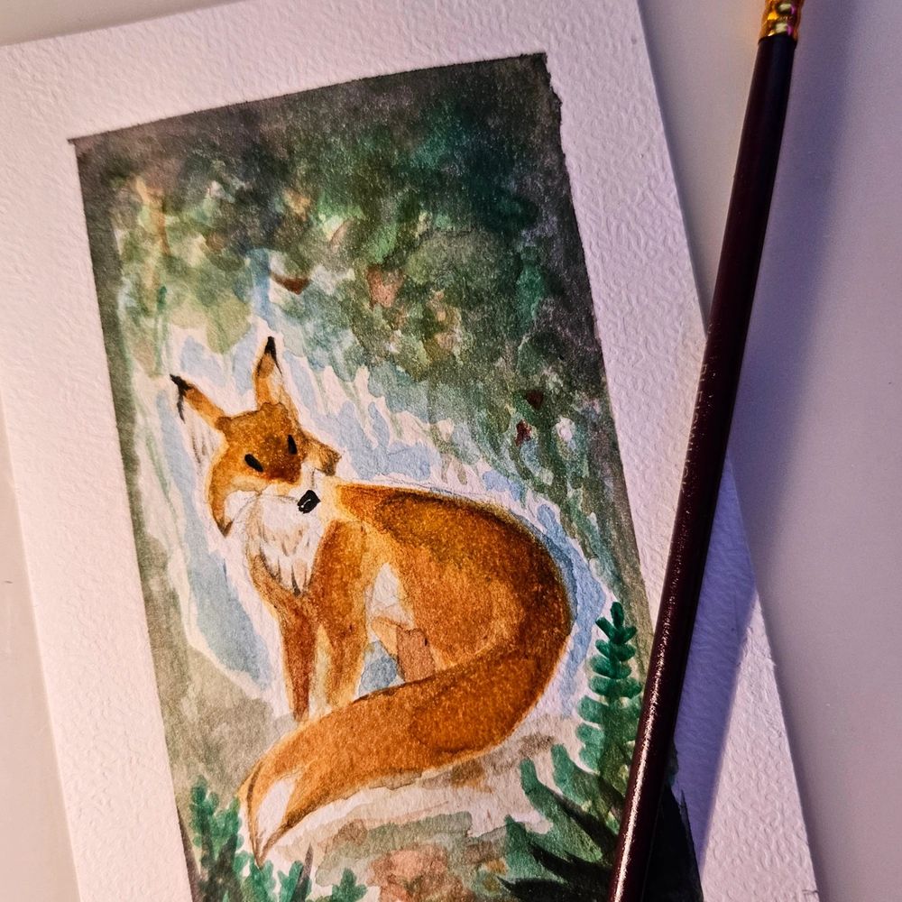 Watercolor painting of a fox sitting in a forest.