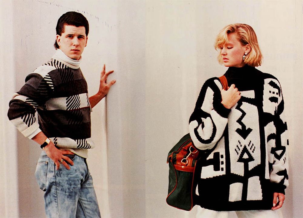 Two people model bold sweaters. On left sweater with large squares with acid washed jeans; on right oversize black and white geometric patterned sweater with white pants. Photos by Matt Zwick/Kim Shaff