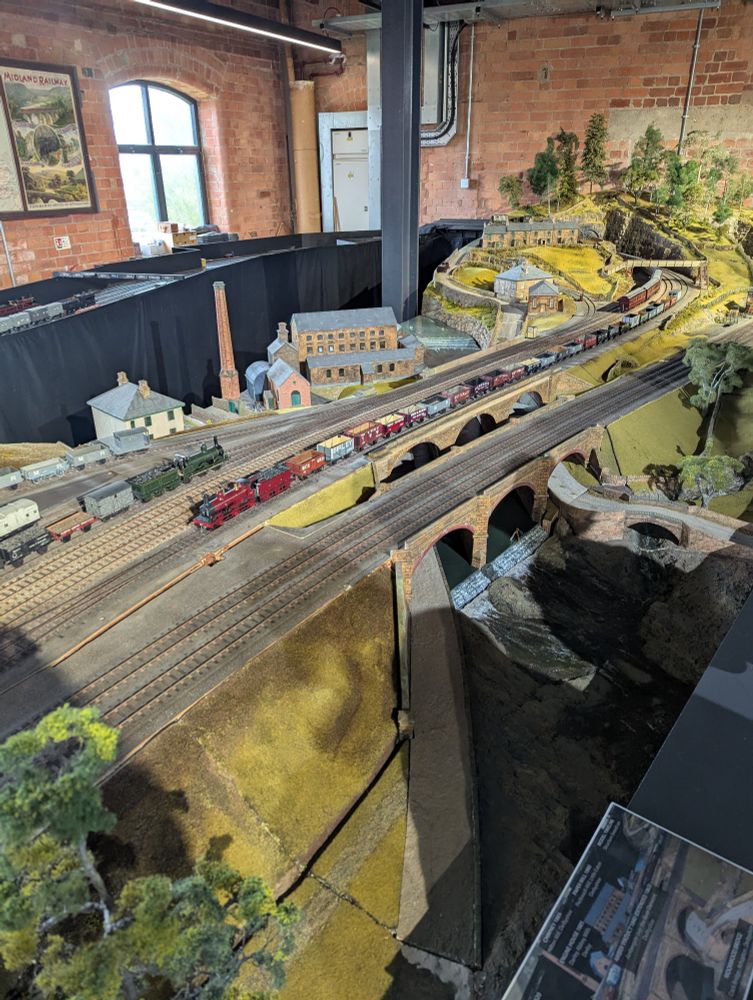 Image of large model railway setup in old mill building 