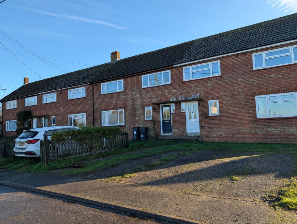 Terrace of brick-built council housing