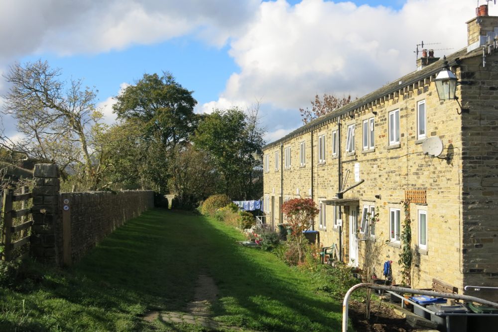 Stone terrace of housing and moorland