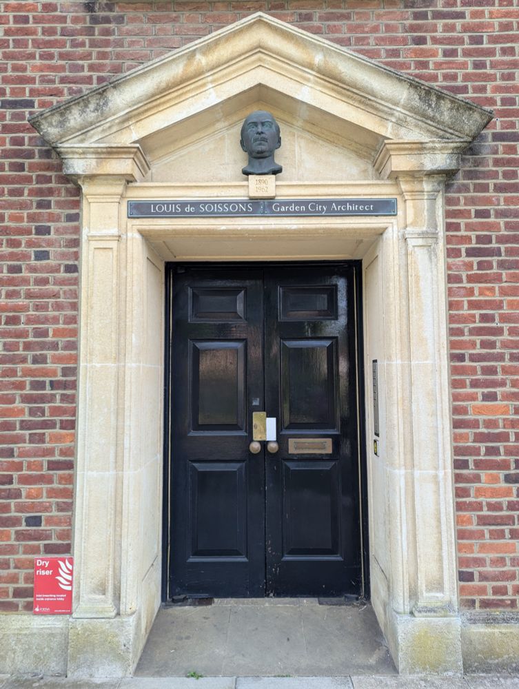 Doorway with bust of Louis de Soissons in pediment