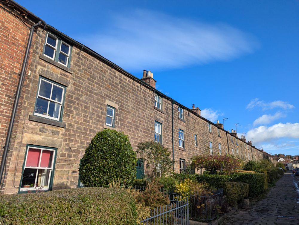 Three-storey stone terrace rising uphill