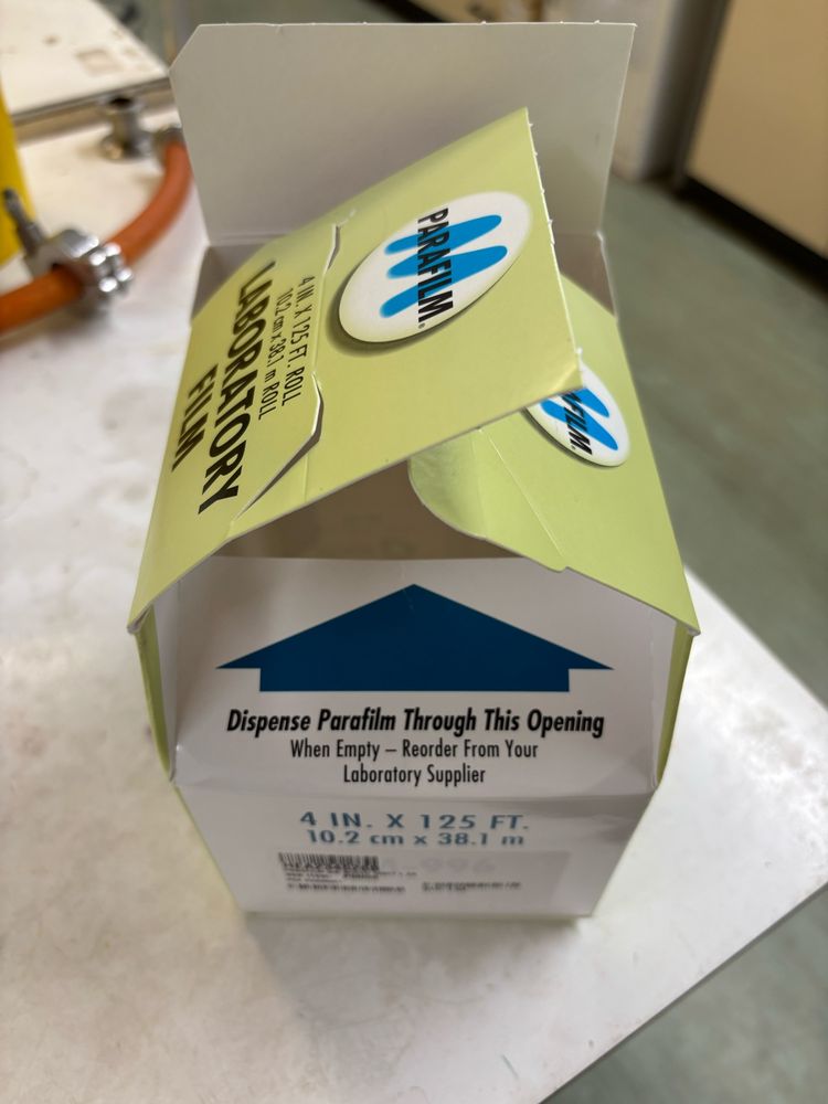 This image shows a black van event: an empty box of Nescofilm.