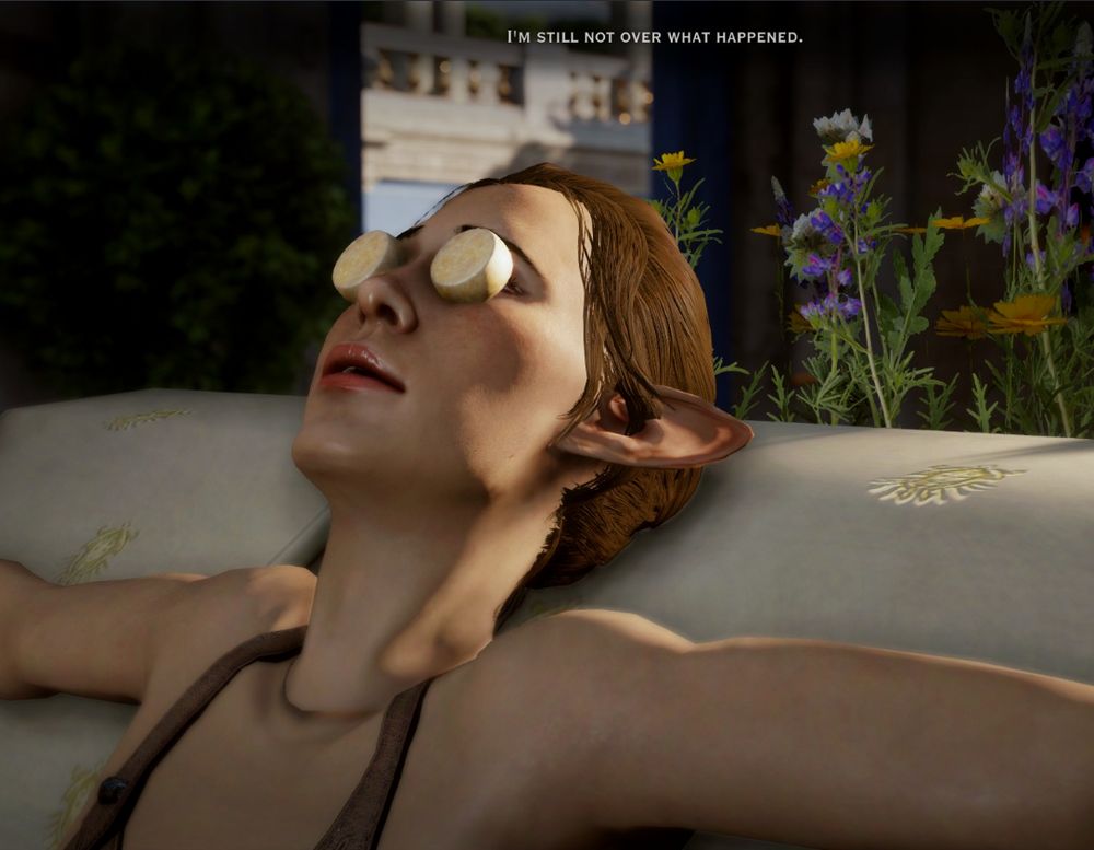 My elf character in DA:I with cheese wheels on her eyes and arms outstretched leaning on a white spa couch sofa thing. She says "I'm still not over what happened"