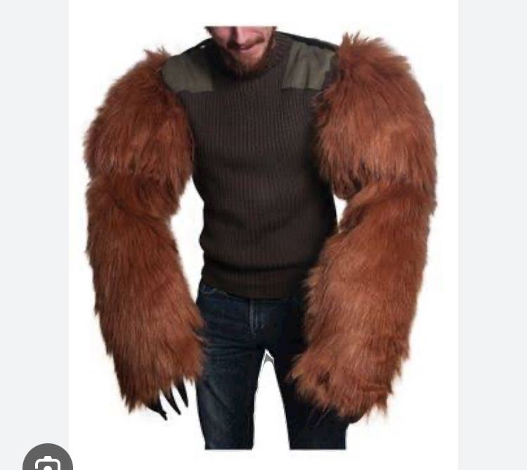 Image of a man with big, furry dress up bear arms. 