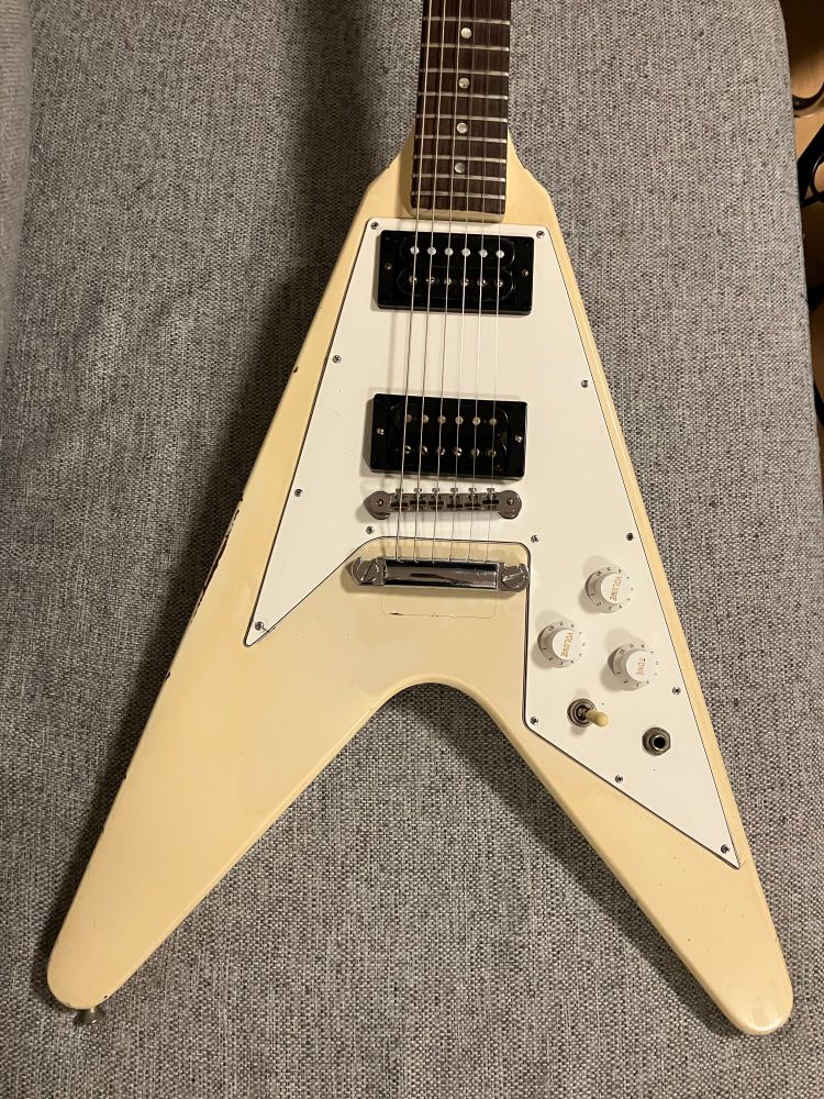 white flying V with white knobs
