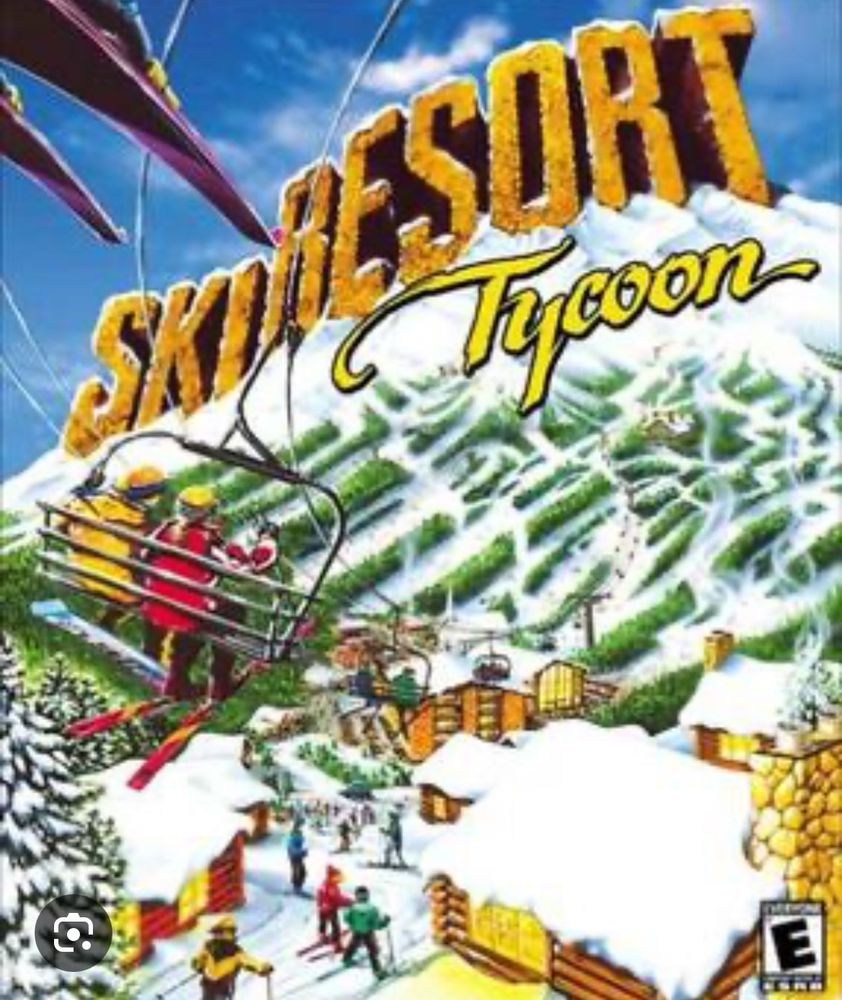 The cover for the video game “Ski Resort Tycoon” showing 2 skiers on a chair lift over a resort full of cabins and ski slopes