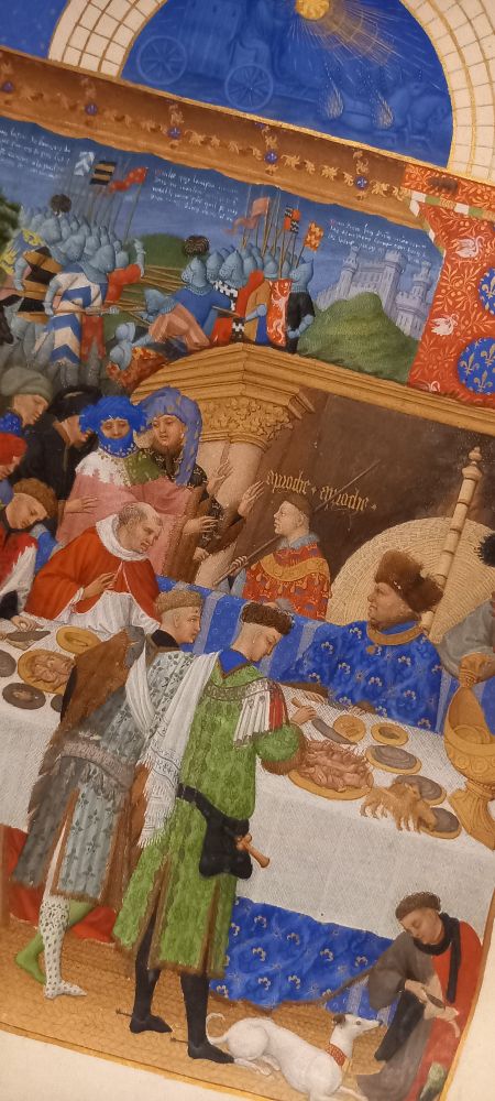 Exhibition Très Riches Heures de Duc de Berry, Château de Chantilly, Summer 2025: calendar page of January with festive meal by Limbourg brothers (photo: A. Willemsen, Leiden, 2025)