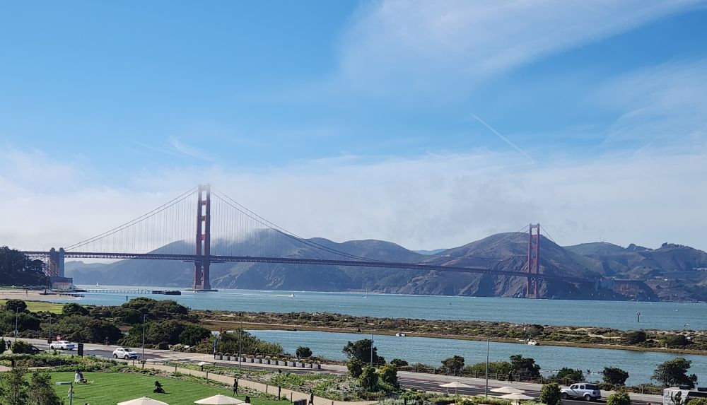 The San Francisco Gold Gate Bridge on a clear afternoon in late summer from the Presidio public park