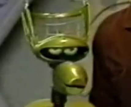 Crow t. robot from mystery science theater 3000 looking into the camera with an annoyed and disbelieving look