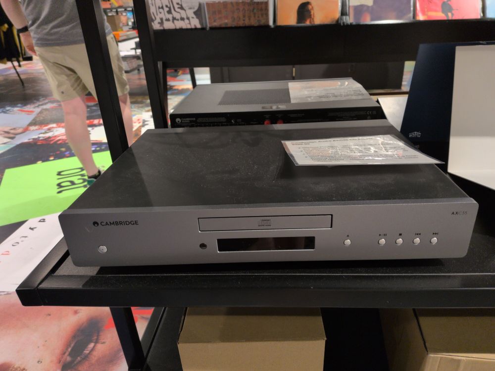 It's a CD player with exactly one slot, 4 buttons, no features, advertised as 'slim' but is twice as big as any VHS player you've ever owned or 12 mac book airs stacked up 6 high aside. 
