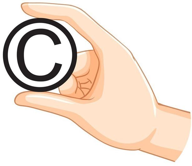 Hand holding a copyright symbol