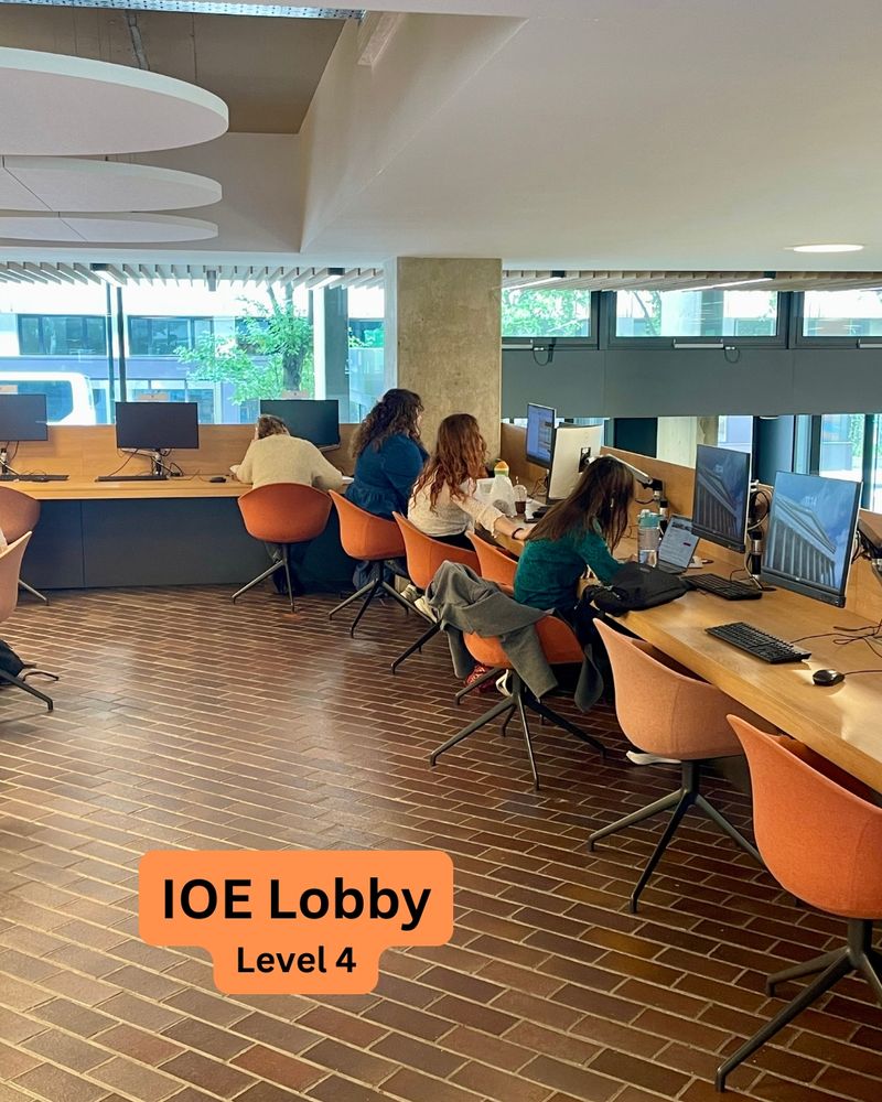 People studying at desks with computers. Text says IOE Lobby, Level 4