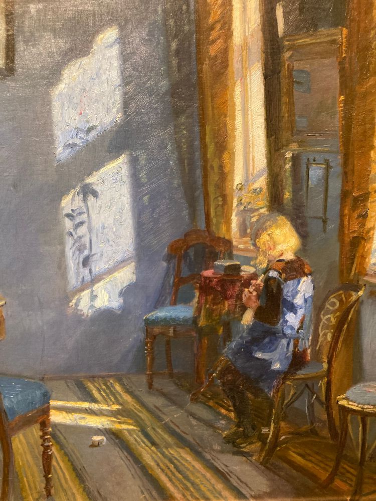  Sunlight in the Blue Room

1891

Oil on canvas

This is regarded as one of Ancher's most important paintings. She depicts her daughter, Helga (1883-1964), within the

'Blue Room' of Brondum's Hotel, the guest house run by her parents. Diagonal rays of light dominate the painting's composition.

This light becomes almost tangible, illustrated with thickly painted squares on the back wall of the room.

When the painting was first exhibited in Copenhagen in 1892, it received mixed reactions. An anonymous critic in a national newspaper complained that certain artists had become 'too modern' and should leave their paintings at home in the private confines of their studio.

Skagens Museum

