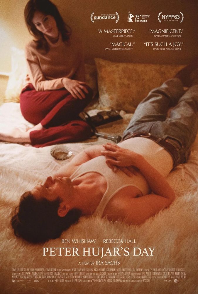 Film poster for Peter Hujar’s day, showing Ben Whishaw (as Hujar) lying face up on a bed, while Rebecca Hall (as Rosenkrantz) sits nearby 