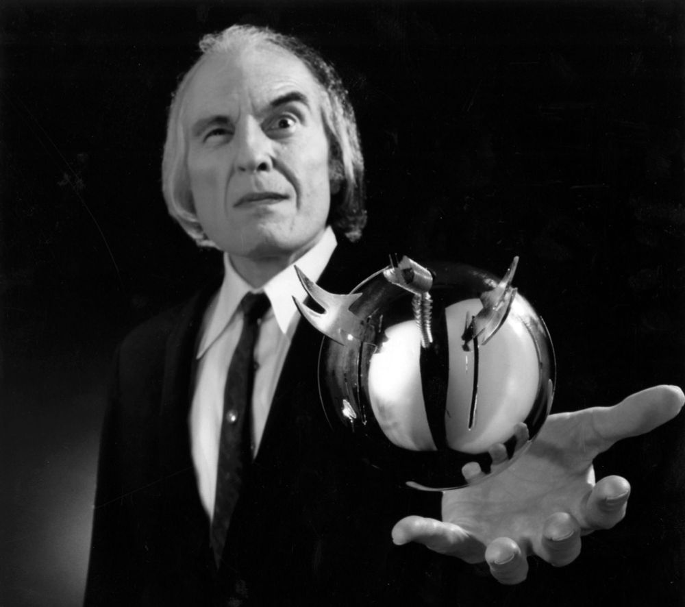 The Tall Man from “Phantasm” holding one of his deadly flying spheres